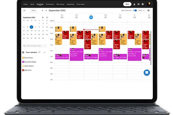 Laptop mock up of Housecall Pro's HVAC scheduling software calendar