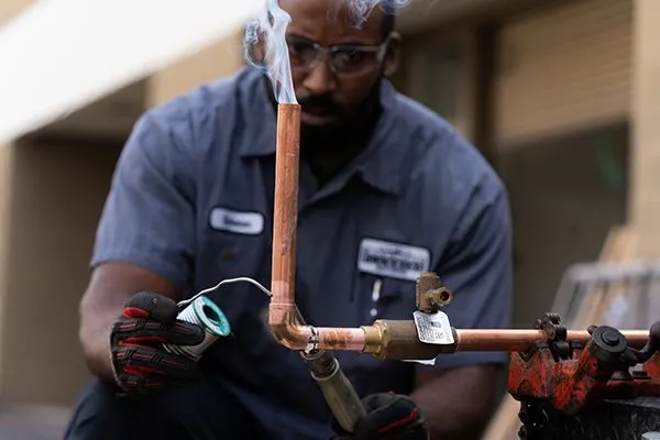 - Housecall Pro Licensed plumber welding copper pipes