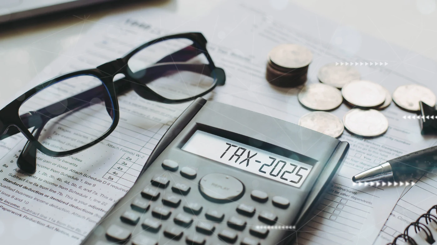 calculating new 2025 tax changes with a calculator