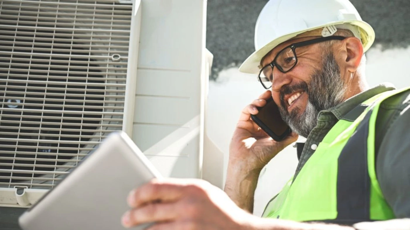 pro on a phone while looking at a tablet.